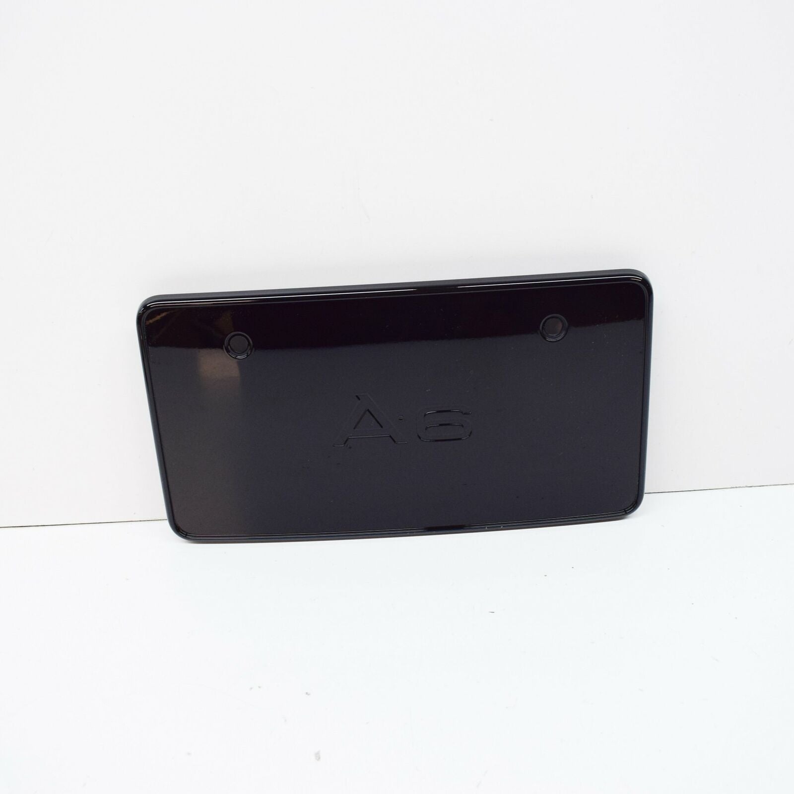 NEW AUDI A6 C6 FRONT LICENCE PLATE TRIM 4F0807285CCT94 ORIGINAL