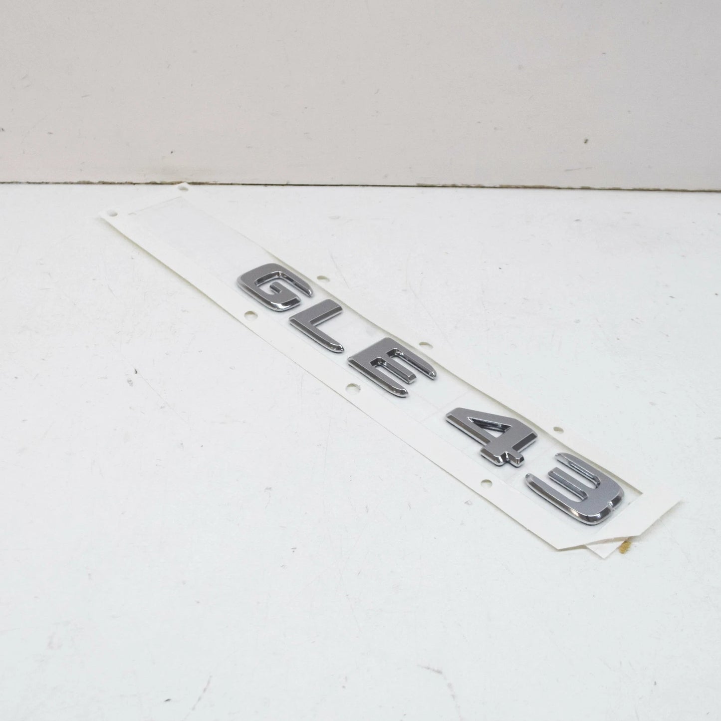 NEW MB GLE W166 REAR TRUNK BOOTLID EMBLEM BADGE A1668176400