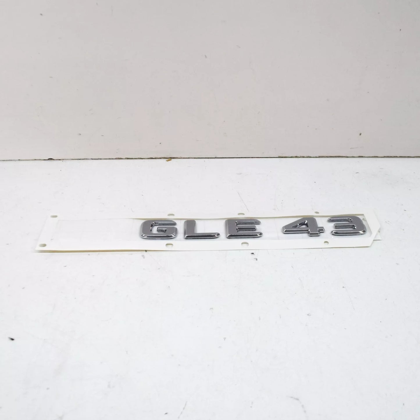 NEW MB GLE W166 REAR TRUNK BOOTLID EMBLEM BADGE A1668176400