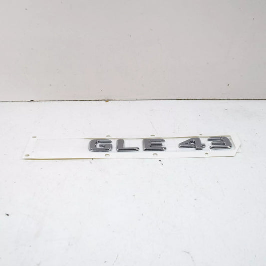 NEW MB GLE W166 REAR TRUNK BOOTLID EMBLEM BADGE A1668176400