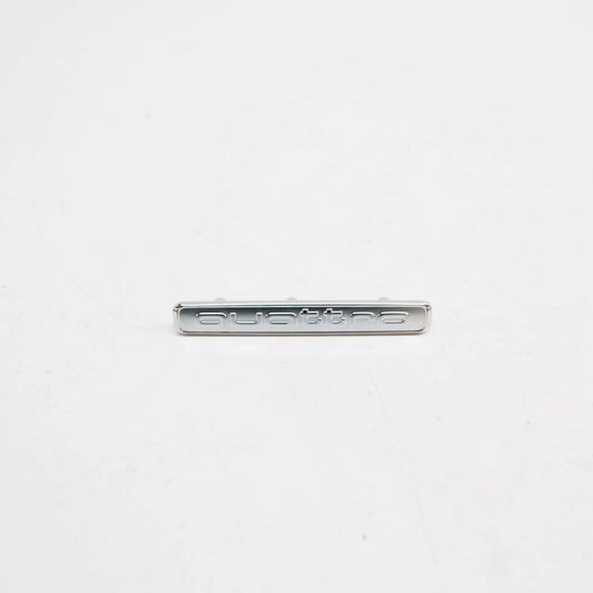 NEW AUDI A4 AVANT B9 DASHBOARD EMBLEM 'QUATTRO' 8W0853191A3Q7 ORIGINAL