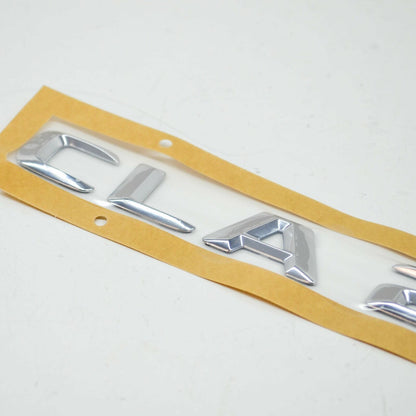NEW MERCEDES-BENZ CLA COUPE C117 BOOTLID BADGE A1178171215 ORIGINAL