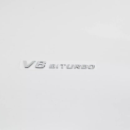 NEW MERCEDES-BENZ E 63 AMG W212 V8 BITURBO FENDER EMBLEM A2218171715 ORIGINAL