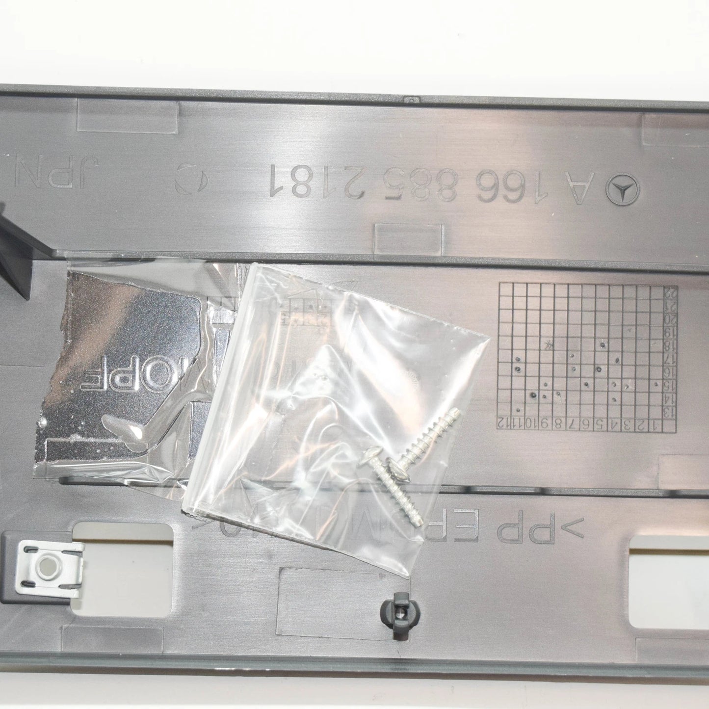 NEW MERCEDES-BENZ ML W166 FRONT BUMPER LICENSE PLATE HOLDER A1668800244 ORIGINAL