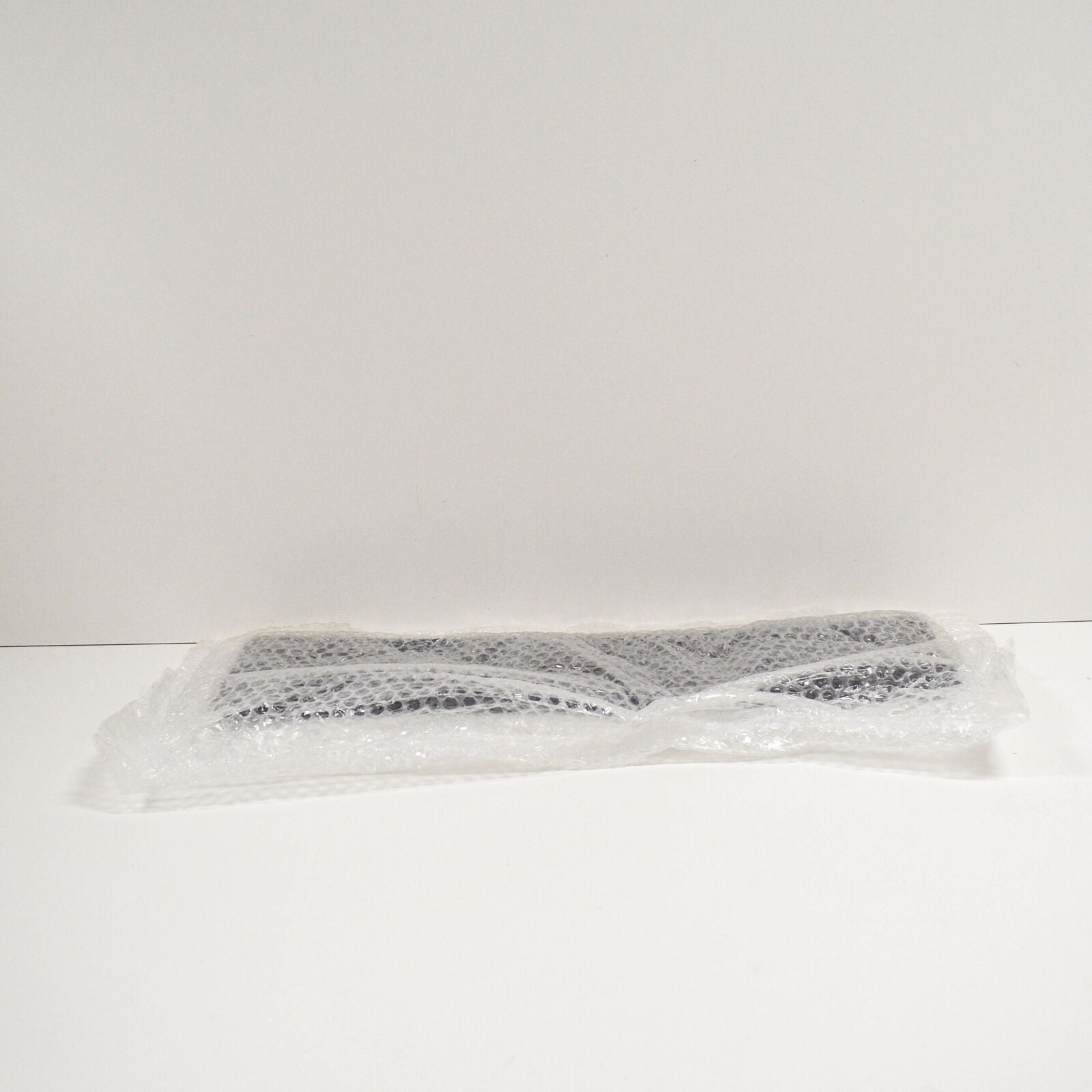 NEW VW TIGUAN 5N FRONT BUMPER LICENSE PLATE HOLDER 5N0807287E9B9 ORIGINAL