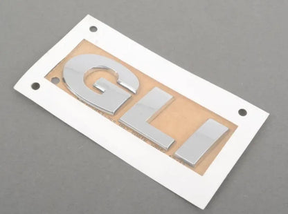 NEW VOLKSWAGEN JETTA A6 MK6 REAR LID BADGE 1K5853675S739 ORIGINAL