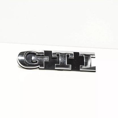 NEW VOLKSWAGEN GOLF MK6 GTI FRONT GRILLE BADGE EMBLEM 1K6853679DFXC ORIGINAL