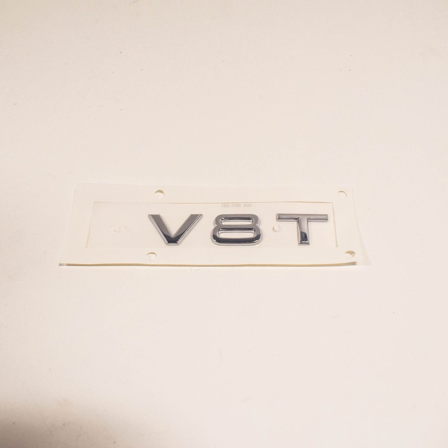 NEW AUDI A8 4H FRONT BUMPER SIDE EMBLEM INSCRIPTION BADGE 4H0853601 2ZZ ORIGINAL