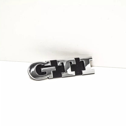 NEW VOLKSWAGEN GOLF MK6 GTI FRONT GRILLE BADGE EMBLEM 1K6853679DFXC ORIGINAL