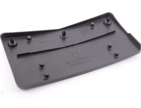 NEW MERCEDES-BENZ E W212 FRONT BUMPER LICENSE PLATE MOLDING A2128850581 ORIGINAL