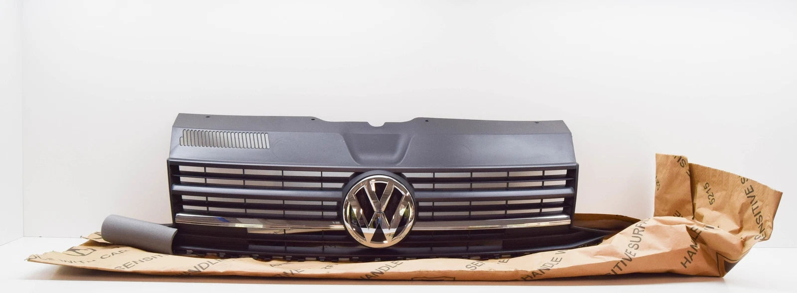 NEW VOLKSWAGEN TRANSPORTER T6 FRONT BUMPER RADIATOR GRILLE 7E0853651A ORIGINAL