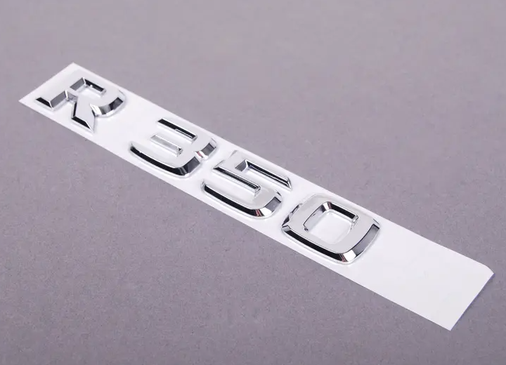 NEW MERCEDES-BENZ R-CLASS W251 REAR PANEL DOOR BADGE A2518170215 ORIGINAL