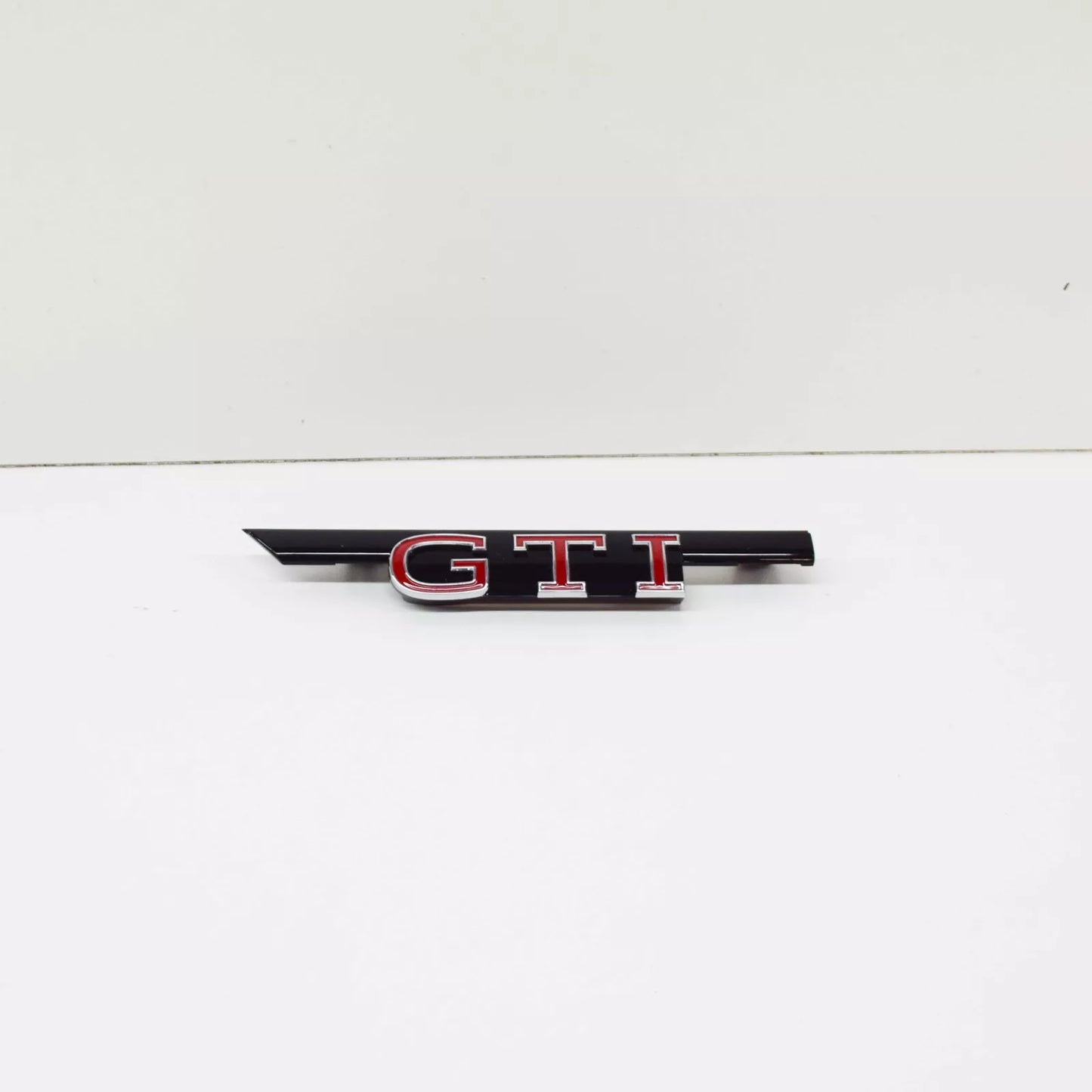 NEW VW GOLF MK8 RADIATOR GRILLE 'GTI' INSCRIPTION 5H0853679MKRR ORIGINAL