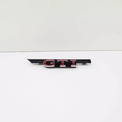 NEW VW GOLF MK8 RADIATOR GRILLE 'GTI' INSCRIPTION 5H0853679MKRR ORIGINAL