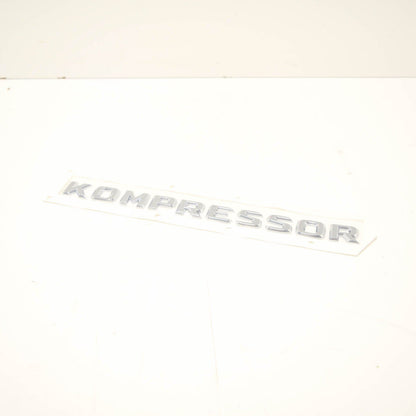 NEW MB SLK R170 TRUNK LID KOMPRESSOR CHROME BADGE A2038173015 ORIGINAL