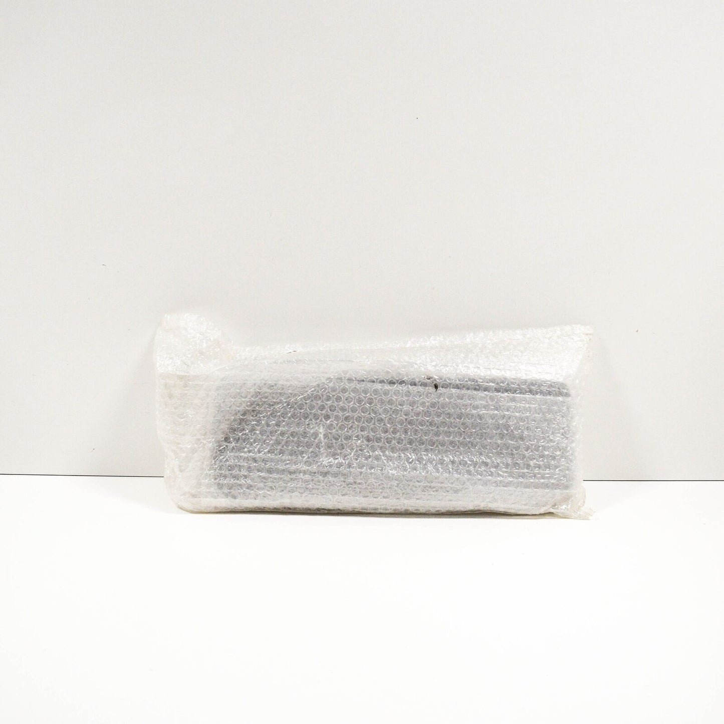 NEW AUDI A6 C6 FRONT BUMPER LICENSE PLATE TRIM 4F0807285CA3FZ ORIGINAL