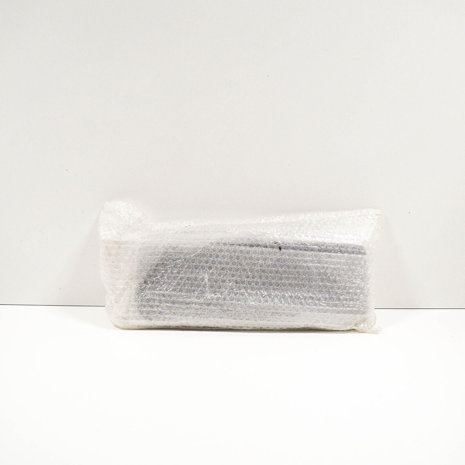 NEW AUDI A6 C6 FRONT BUMPER LICENSE PLATE TRIM 4F0807285CA3FZ ORIGINAL