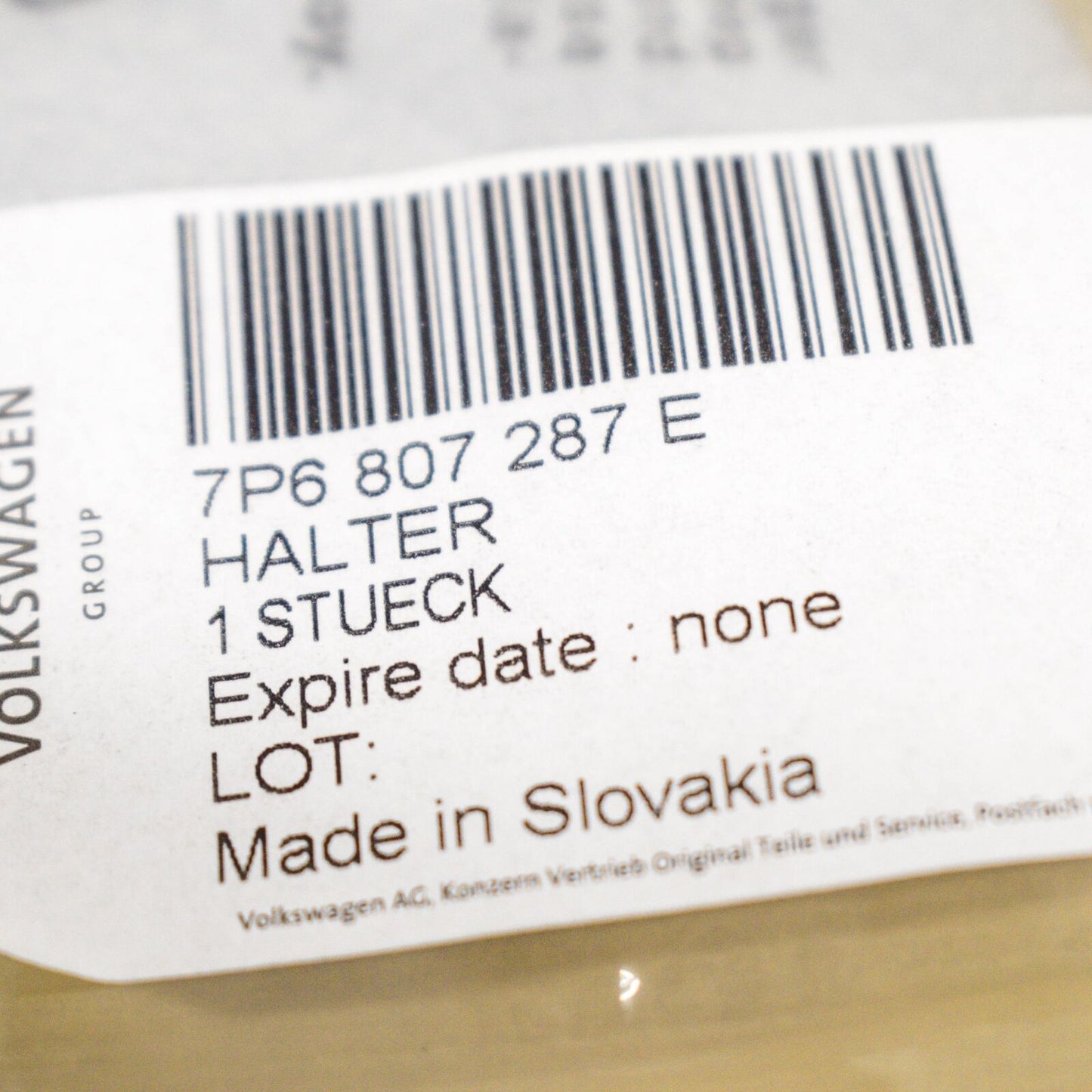 NEW VW TOUAREG 7P FRONT BUMPER NUMBER LICENSE PLATE HOLDER 7P6807287E ORIGINAL