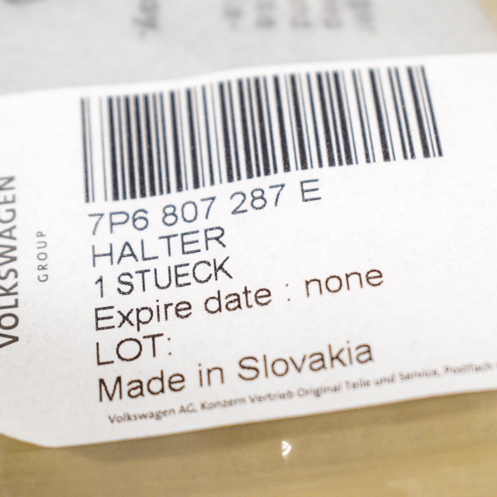 NEW VW TOUAREG 7P FRONT BUMPER NUMBER LICENSE PLATE HOLDER 7P6807287E ORIGINAL