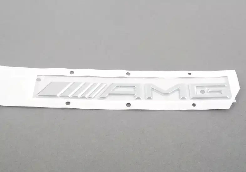 NEW MB E W212 AMG REAR TAIL BOOT LID EMBLEM BADGE NAMEPLATE A0008170414 ORIGINAL