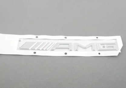 NEW MB E W212 AMG REAR TAIL BOOT LID EMBLEM BADGE NAMEPLATE A0008170414 ORIGINAL