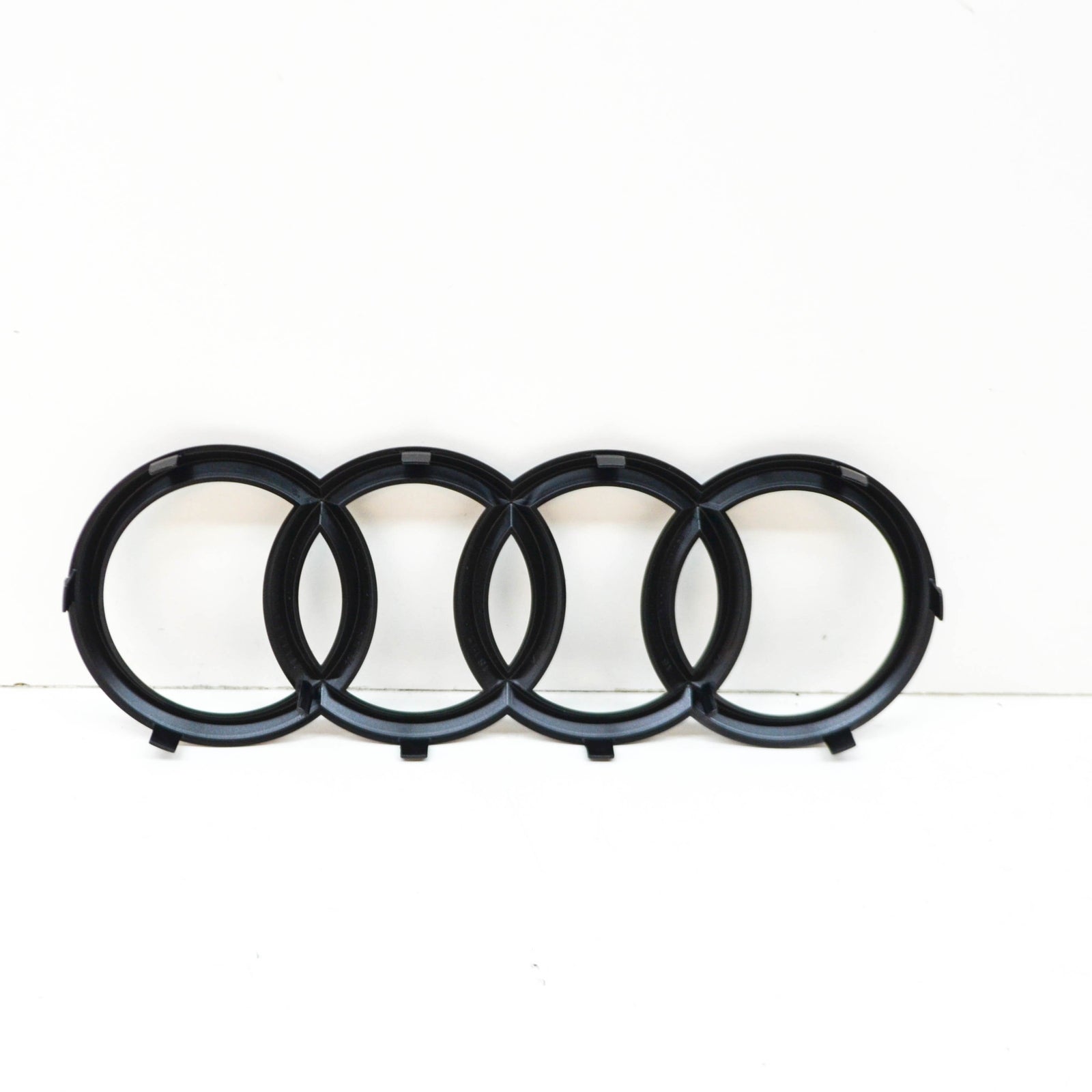 NEW AUDI Q7 4M FRONT BUMPER RADIATOR GRILLE BADGE LOGO 4M0853605T94 ORIGINAL