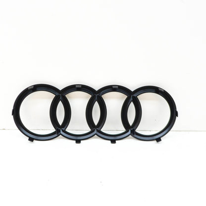 NEW AUDI Q7 4M FRONT BUMPER RADIATOR GRILLE BADGE LOGO 4M0853605T94 ORIGINAL