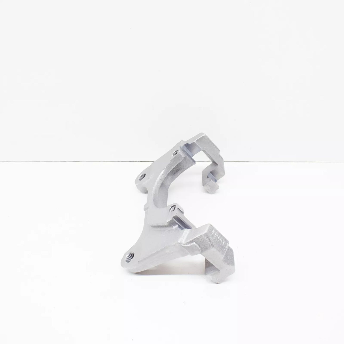 NEW VOLKSWAGEN EOS FRONT BRAKE CALIPER CARRIER 1K0615125B ORIGINAL