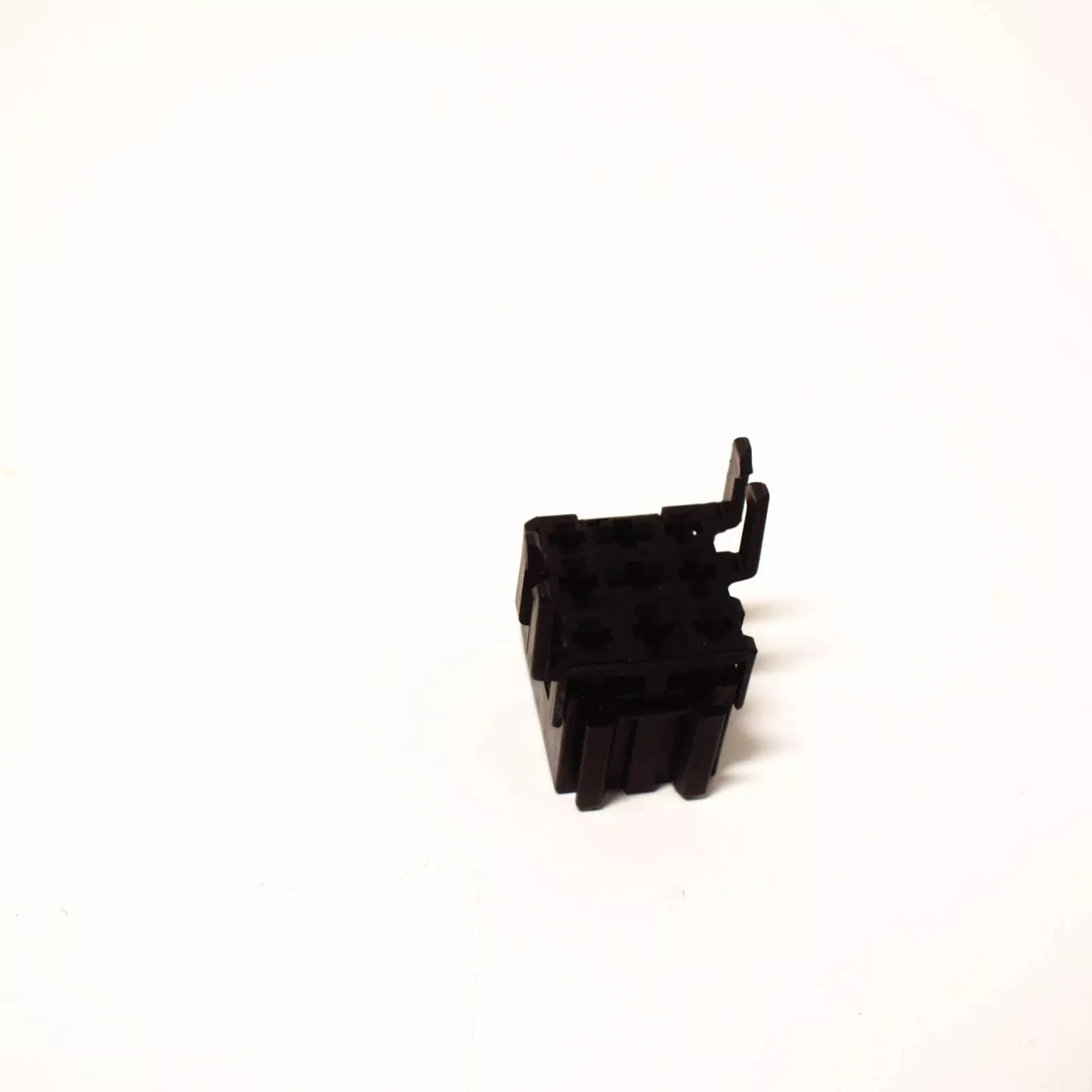 NEW BMW 5 E34 BLACK RELAY MOUNT HOLDER 61131389114 ORIGINAL