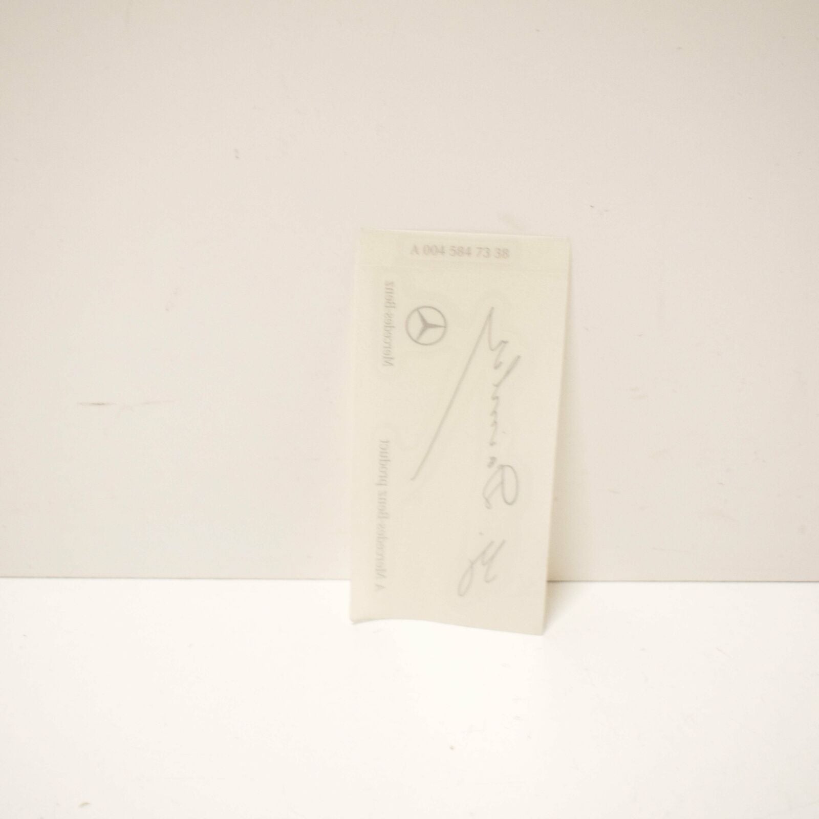 NEW MERCEDES G DAIMLER SIGNED CLEAR WINDSHIELD GLASS DECAL A0045847338 ORIGINAL