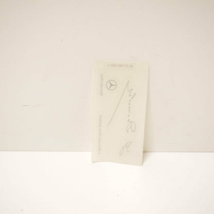 NEW MERCEDES G DAIMLER SIGNED CLEAR WINDSHIELD GLASS DECAL A0045847338 ORIGINAL