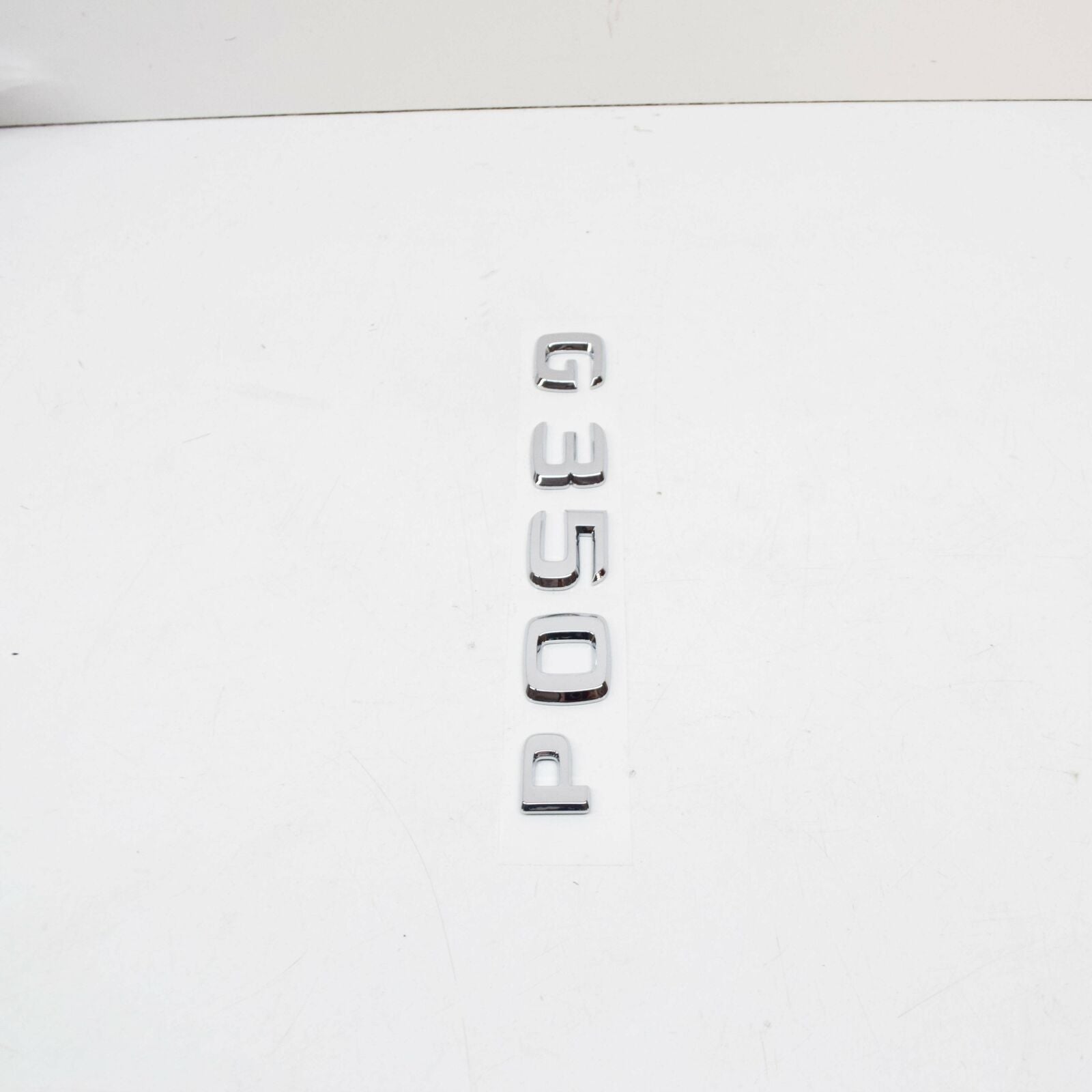 NEW MERCEDES-BENZ G W463 REAR MODEL PLATE BADGE A4638171400 ORIGINAL