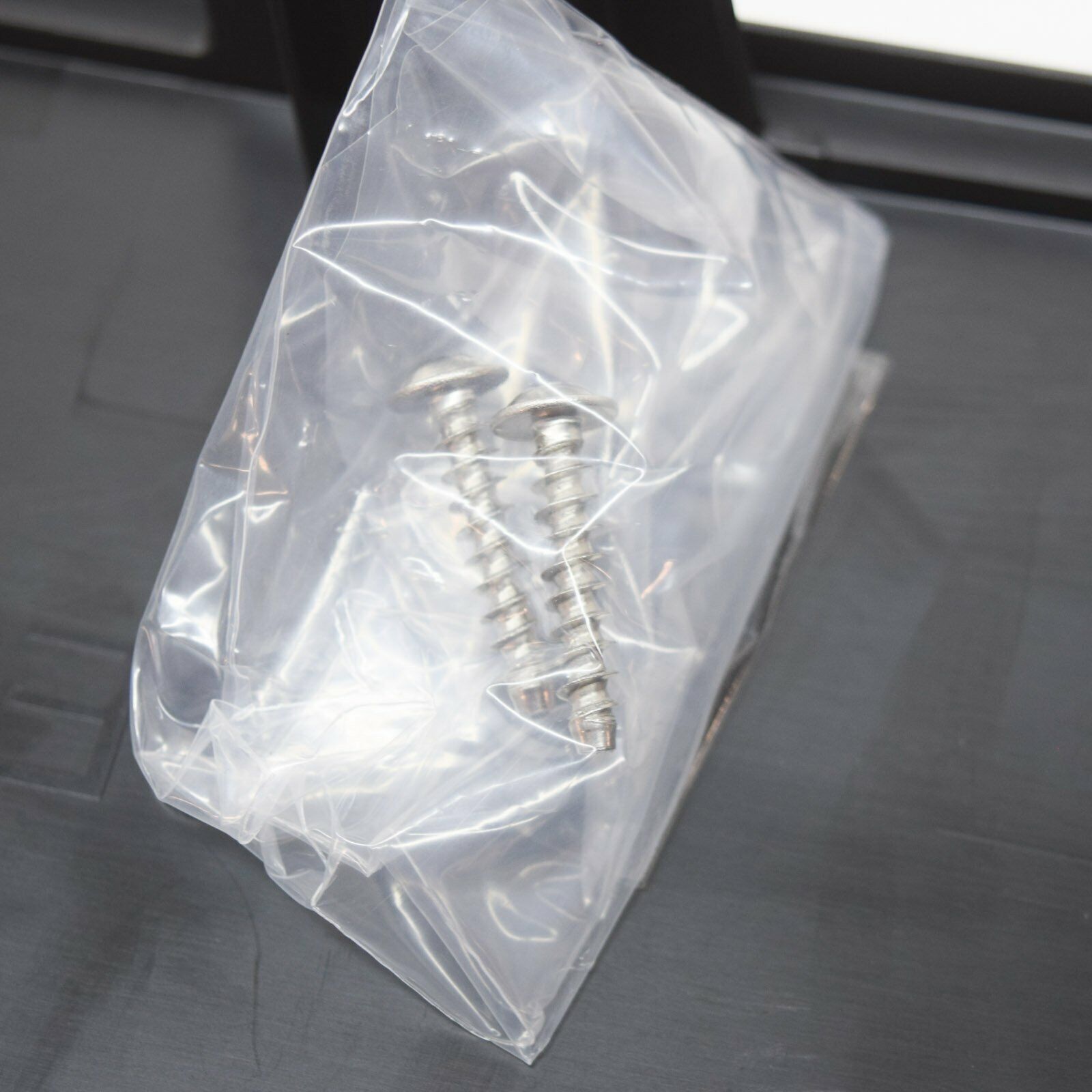 NEW MERCEDES-BENZ C-CLASS W205 NUMBER PLATE TRIM HOLDER A2058803305 ORIGINAL